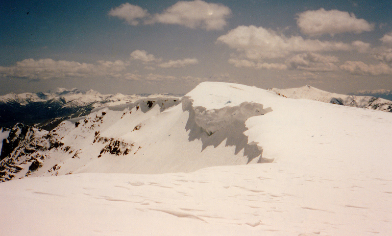 The summit of Mount Carpenter on June 1, 1996. In the background are Montana's Lima Peaks.