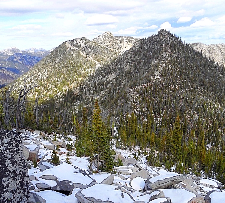 The central Lick Creek crest, east of Payette Lake is rugged and remote. This photo taken from Bearpaw Peak shows the crest from Rainbow Peak to Nick Peak (just to the left andmway in the distance). John Platt Photo