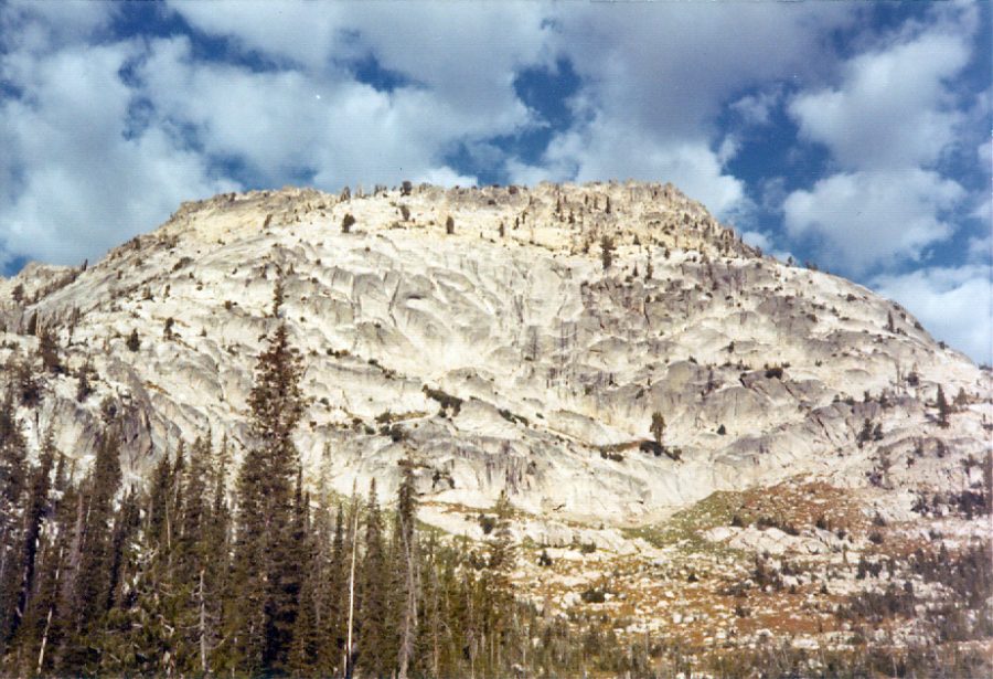 The east face of Peak 9980. The first ascent line is located right of center. Bob Boyles Photo 