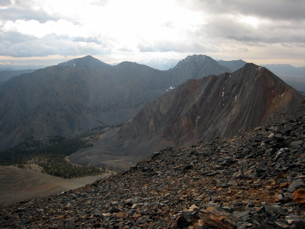 The northern section of the Range includes dozens of challenging peaks. The view south from,Gooseberry Peak includes Pavlos, Petros and Pahsimeroi Pyramid. George Reinier Photo 