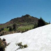 The approach to the summit of Pollock Mountain. The trail ascends the west (left) side or one can scramble up the boulders on the south end of the ridge. July 2004. Mike Hays Photo