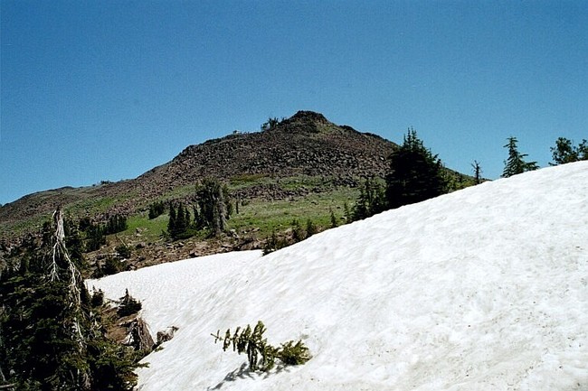 The approach to the summit of Pollock Mountain. The trail ascends the west (left) side or one can scramble up the boulders on the south end of the ridge. July 2004. Mike Hays Photo 