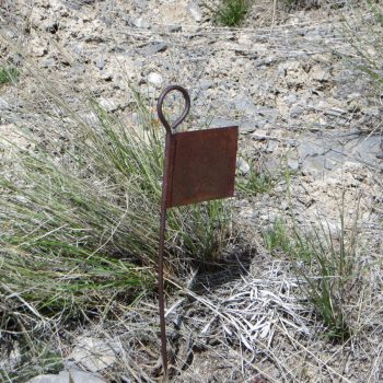 A summit-ish marker on Peak 6934. Steve Mandella photo.