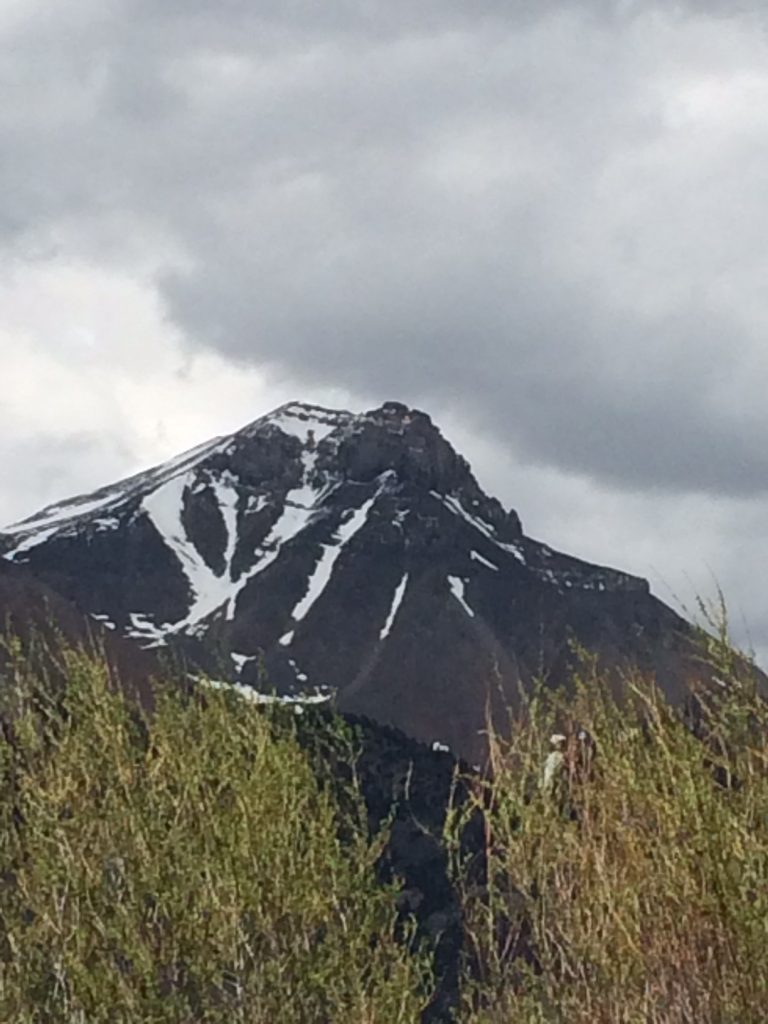 The right tong of the trident leads directly to the summit. The wide section near the top affords a dance-around to avoid 15' of vertical water ice. Neil Gleichman Photo