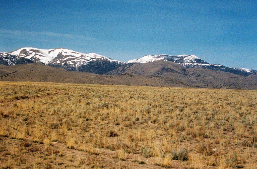 The Owyhee Front from the Snake River Plain. Quicksilver an Hayden Peak.