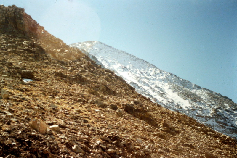 This photo is looking up into the sun toward the summit from midway on the Northeast Ridge Route.