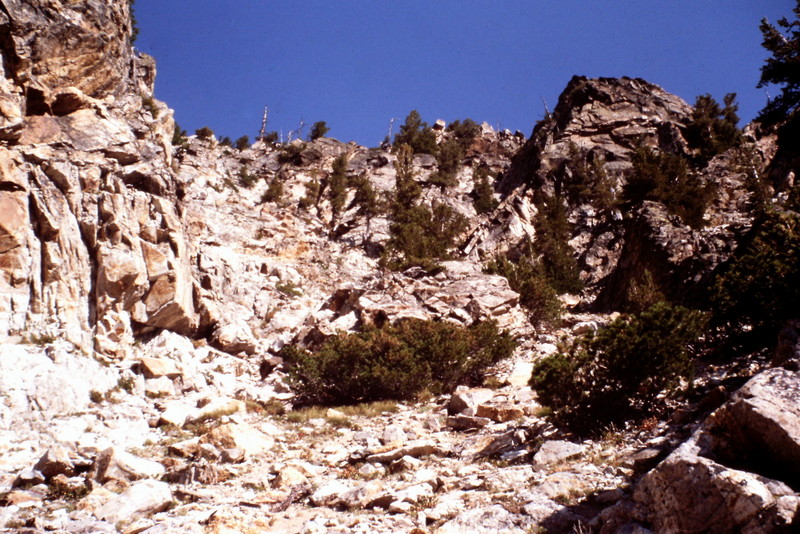 The talus slope eventually leads to the ridge top.