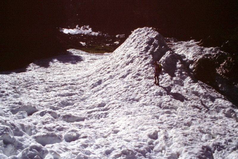 When I climbed the peak on June 24th, 1995, we found the remnants of a huge avalanche that had swept the face. As you climb up the west face you will see that it provides a tremendous area for snow to accumulate.