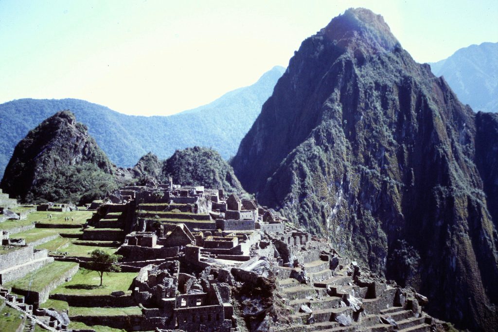 Huayna Picchu rises to the north of Machu Picchu.