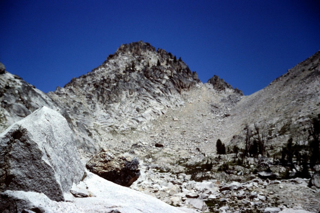 Alpen Peak's west summit. The pass on the left leads into the basin on the south side of Warbonnett Peak. The Pazss on the right leads to Alpine Lake.