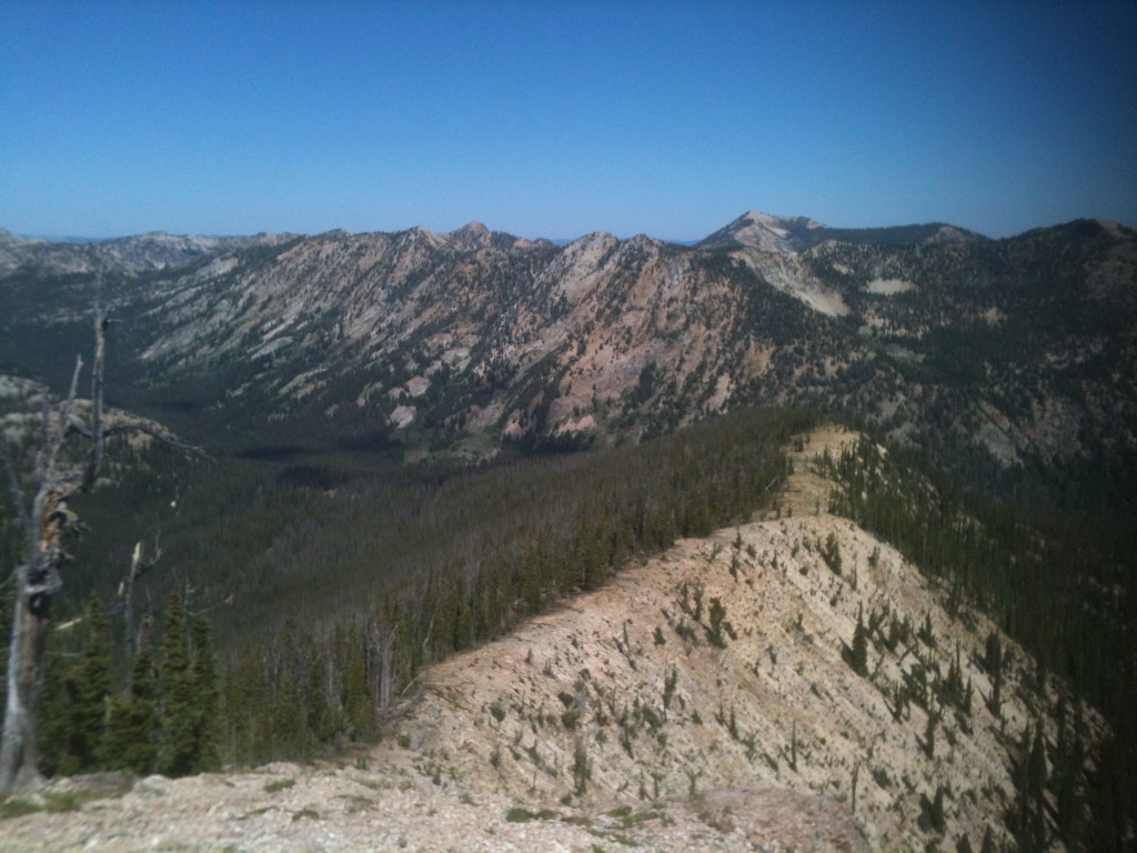 This shot looks back down the sunnit ridge and west to Profile Peak and numerous other peaks in the area.