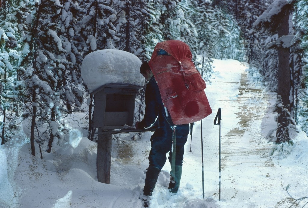 The calm before the storm. Signing the Iron Creek trailhead register. Soon after, it began to snow.