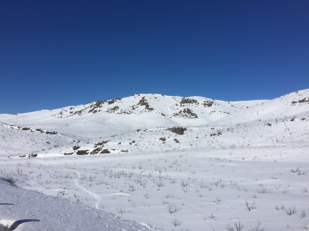 Our route viewed from the highway. We gained the ridge well east of the summit.