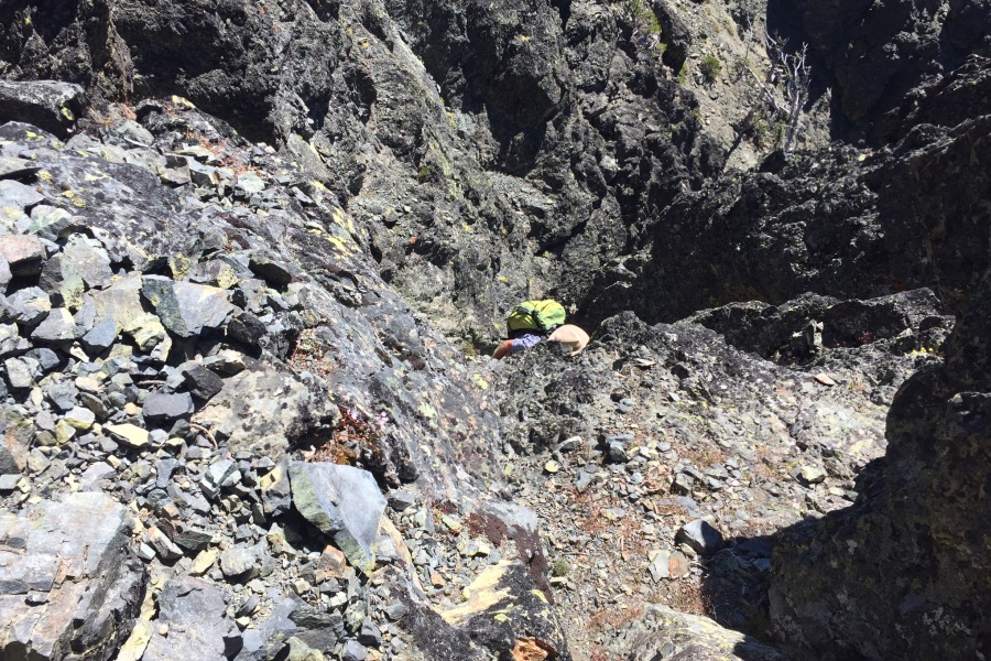 John Platt surmounting the Class 4 section in the gully on the south face.