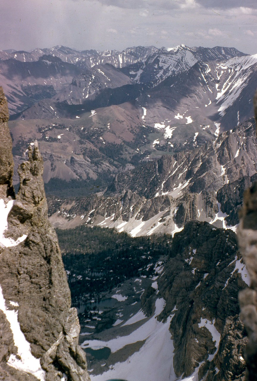 Looking down the col into the East Face cirque. This is where the East Face route joins the Northeast ridge. Photo - Lyman Dye