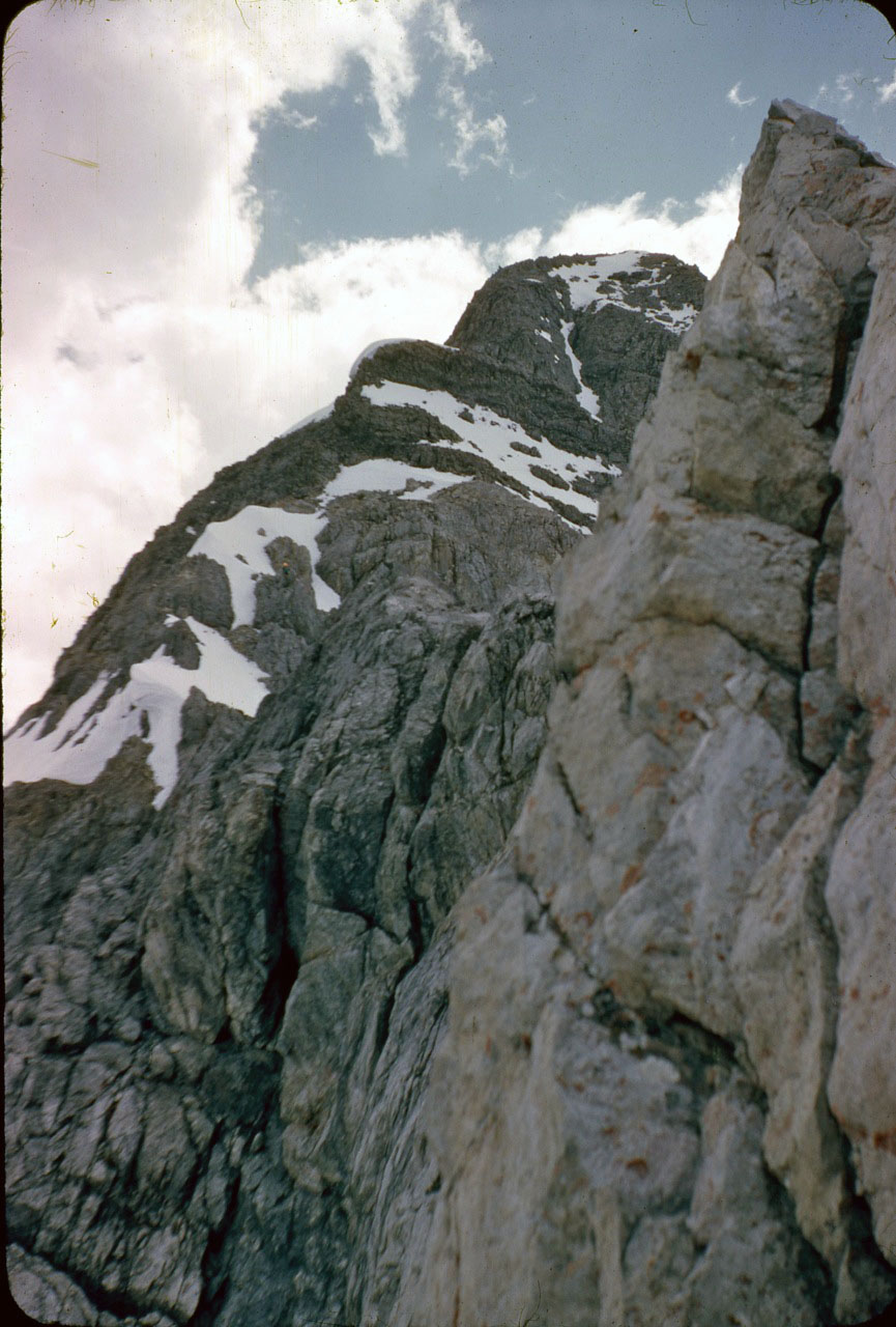 Looking up at the Northeast ridge and summit block (far left). Photo - Lyman Dye