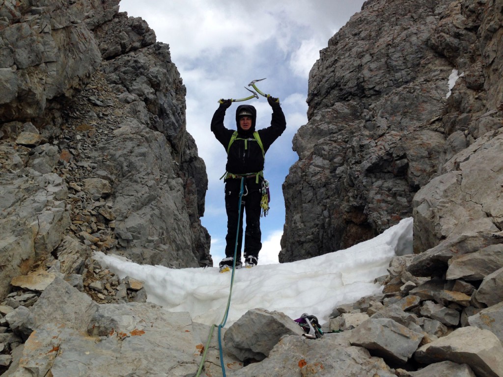 Kevin stands atop the couloir. Photo - Cory Harelson