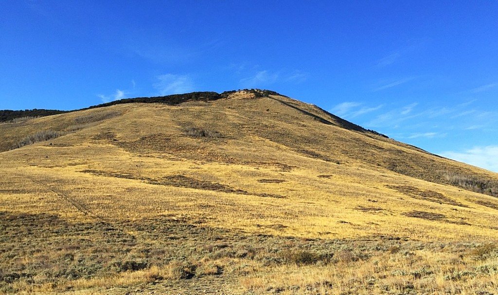 This peaks sits on the western edge of the City of Rocks National Preserve. The route climbs up the open slopes.