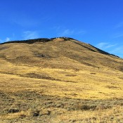 This peaks sits on the western edge of the City of Rocks National Preserve. The route climbs up the open slopes.