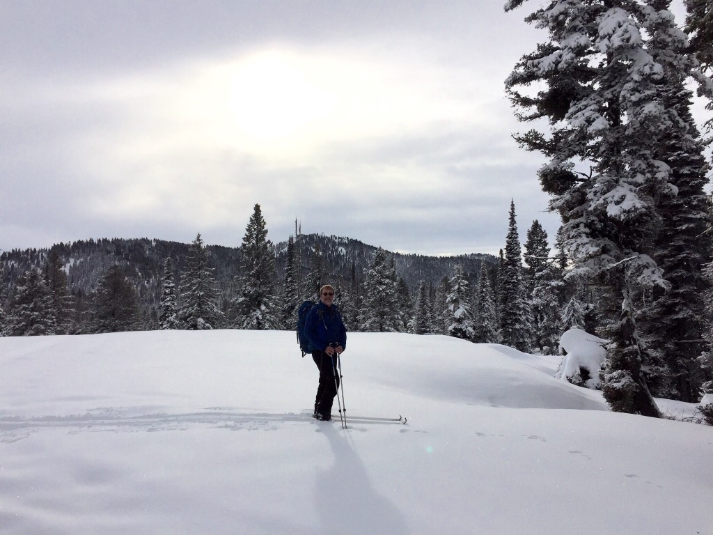 Half way to the top. Sunset Mountain's summit is directly behind Dan Paulson