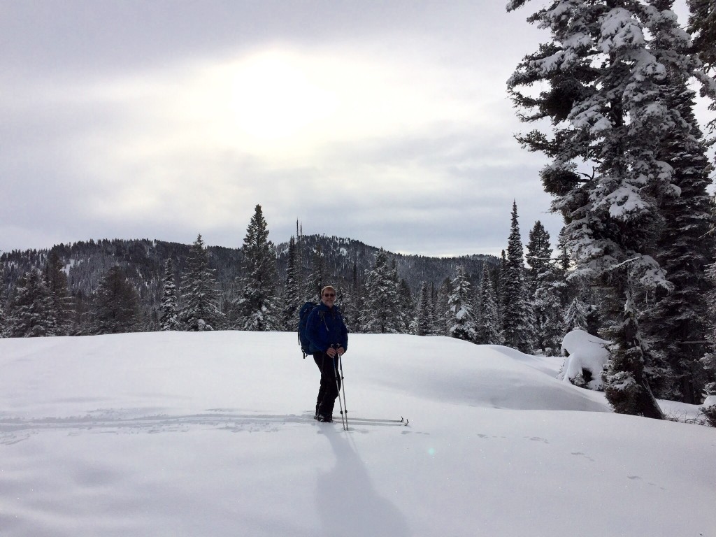 Half way to the top. Sunset Mountain's summit is directly behind Dan Paulson