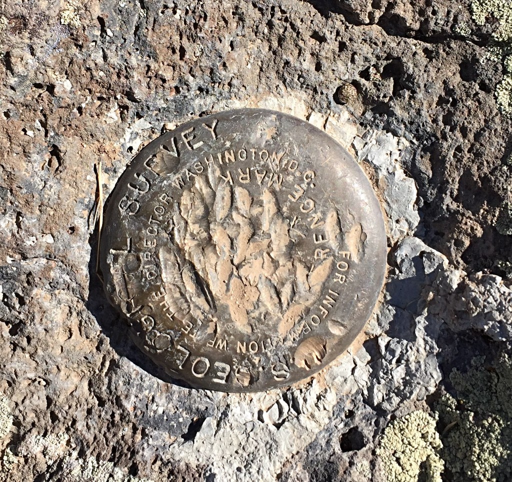 The defaced benchmark on the summit.