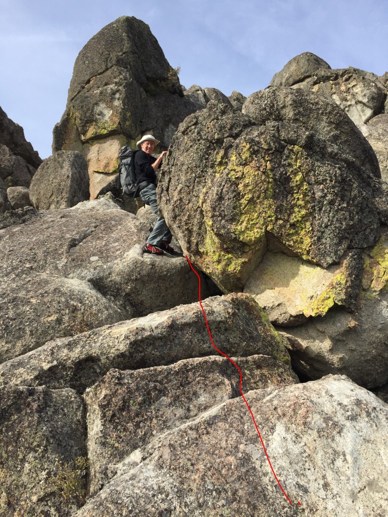 The second part of Standard Route climbs up these steps and then goes around the Boulder.