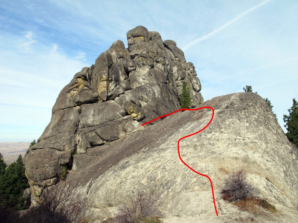 The Standard Route begins by climbing and crossing this slab.