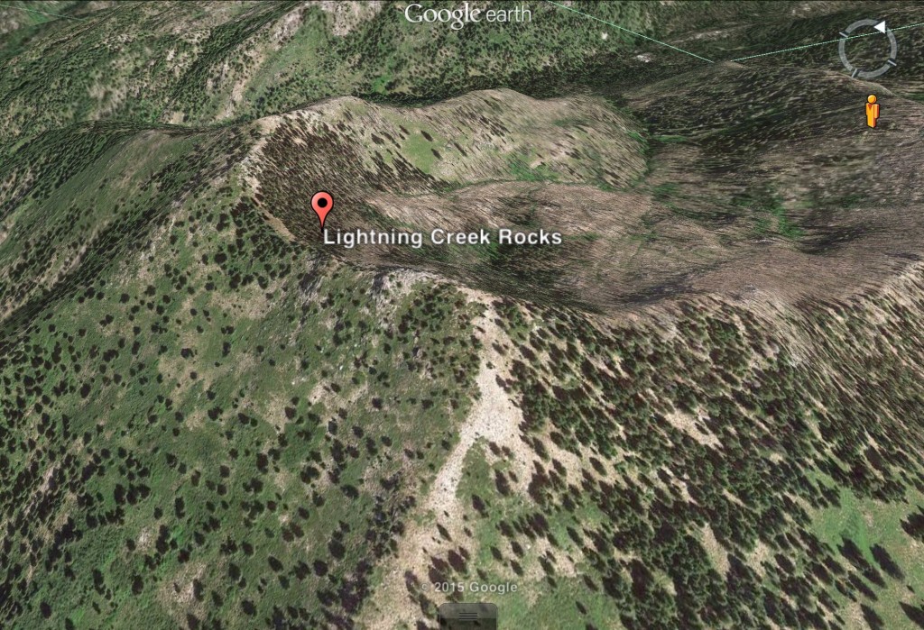 This Google Earth image shows the high point identified as Lightning Creek Rocks. Why is a mystery to me.