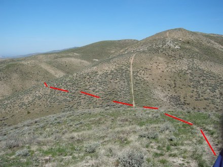 After climbing from the road to the north ridge of Three Point Mountain, look north. The route descends into the a saddle. Follow the marked route around the next rather than climbing up the trail on the ridge. Just stay on or near the ridge crest as it goes up and down to the summit.