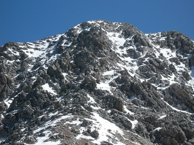 Look for two climbers in the center of the photo.